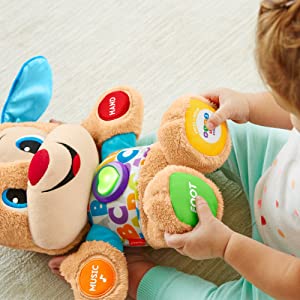 Fisher-Price Puppy Eveil Progressif jouet bébé, peluche interactive, plus de 50 chansons