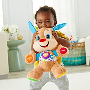 Fisher-Price Puppy Eveil Progressif jouet bébé, peluche interactive, plus de 50 chansons