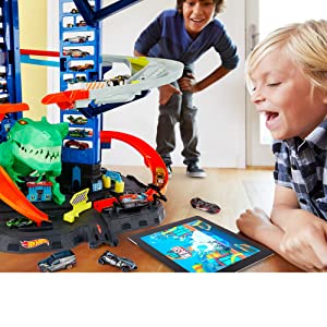 Hot Wheels City Super Dino Robot Garage avec T-Rex, pour contenir jusqu’??100 petites voitures