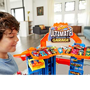 Hot Wheels City Super Dino Robot Garage avec T-Rex, pour contenir jusqu’??100 petites voitures